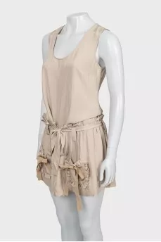 Beige jumpsuit with ruffles