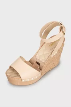 Leather sandals with wooden wedges
