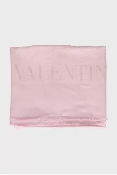 Pink scarf decorated with fringe