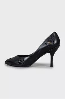 Black leather shoes with perforations
