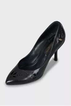 Black leather shoes with perforations
