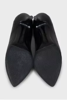 Black leather shoes with perforations
