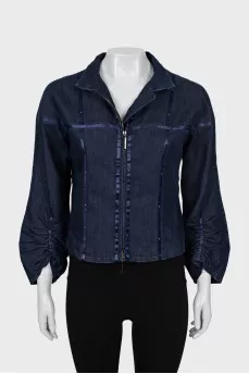 Denim jacket with decorated seams
