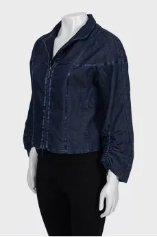 Denim jacket with decorated seams