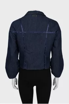 Denim jacket with decorated seams