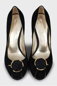 Suede shoes decorated with flowers