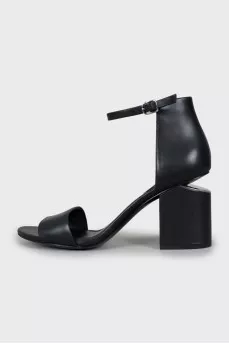 Leather sandals with figured heels