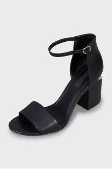 Leather sandals with figured heels