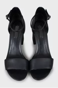 Leather sandals with figured heels