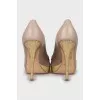 Patent leather shoes with bow