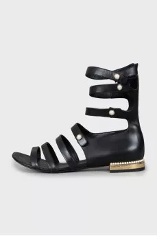 Leather sandals decorated with beads