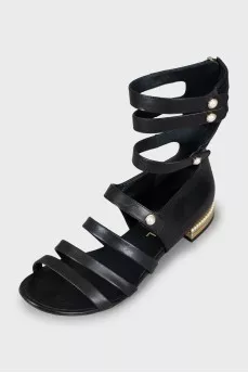 Leather sandals decorated with beads