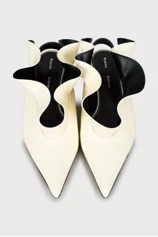 Leather slingbacks decorated with frills