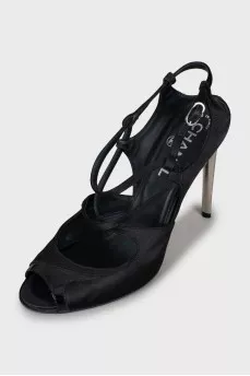 Black sandals with silver heels