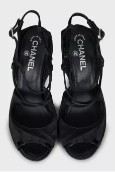 Black sandals with silver heels