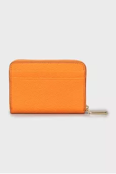 Orange leather wallet with tag