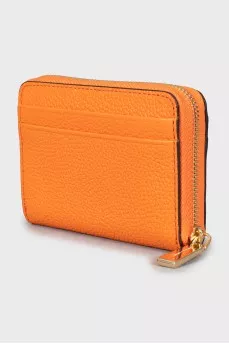 Orange leather wallet with tag