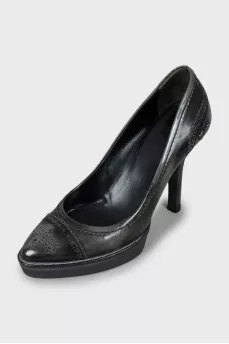 Perforated leather heels