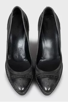 Perforated leather heels