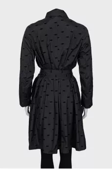 Black raincoat with embossed print