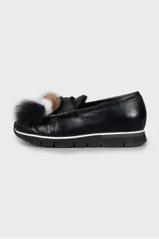 Padded loafers decorated with tassels