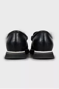 Padded loafers decorated with tassels