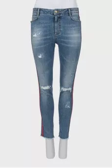 Jeans with stripes and ripped effect