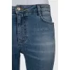 Jeans with stripes and ripped effect