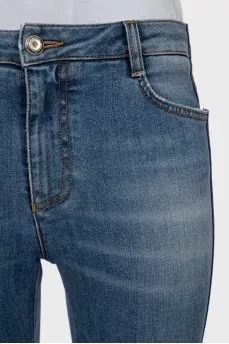 Jeans with stripes and ripped effect