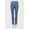 Jeans with stripes and ripped effect