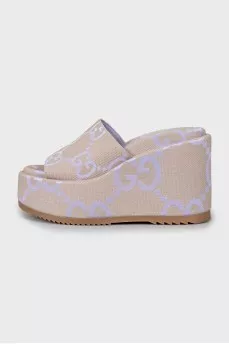 Sandals in a signature print on a wedge heel