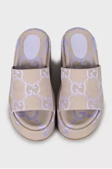Sandals in a signature print on a wedge heel