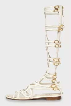 Leather sandals with gold buckles