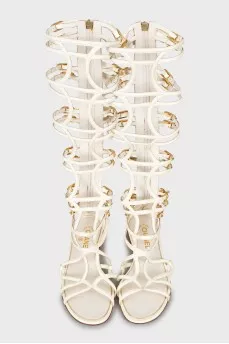 Leather sandals with gold buckles