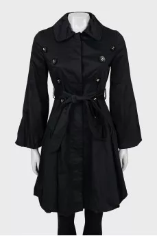 Buttoned raincoat with puff sleeves
