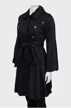 Buttoned raincoat with puff sleeves