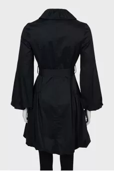 Buttoned raincoat with puff sleeves