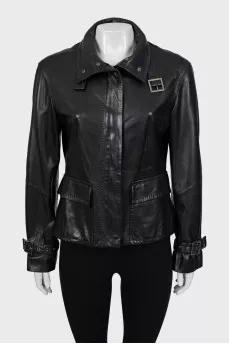 Leather jacket decorated with buckles