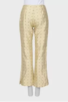 Silk flared trousers with embroidery
