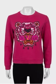 Pink sweatshirt with signature print