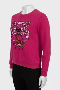 Pink sweatshirt with signature print