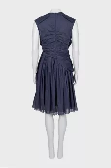 Fitted dress with draping
