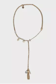 Golden pendant decorated with rhinestones