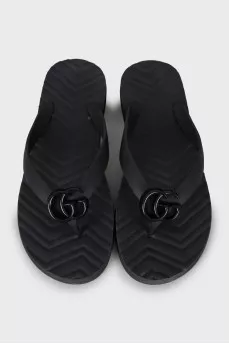 Rubber flip flops with embossed logo