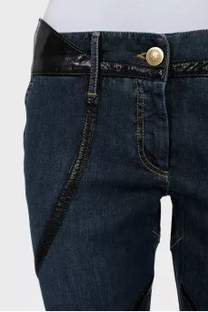 Jeans with faux leather inserts