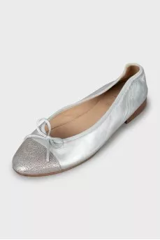 Silver ballet flats decorated with bows