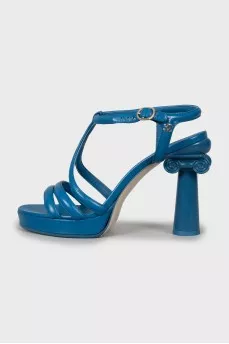 Light blue sandals with a figured heel