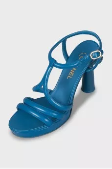 Light blue sandals with a figured heel