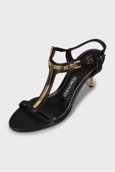 Leather sandals with golden stiletto heels