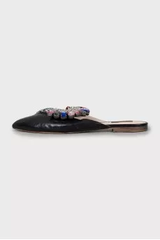 Leather mules decorated with rhinestones